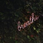 breathe neon signage